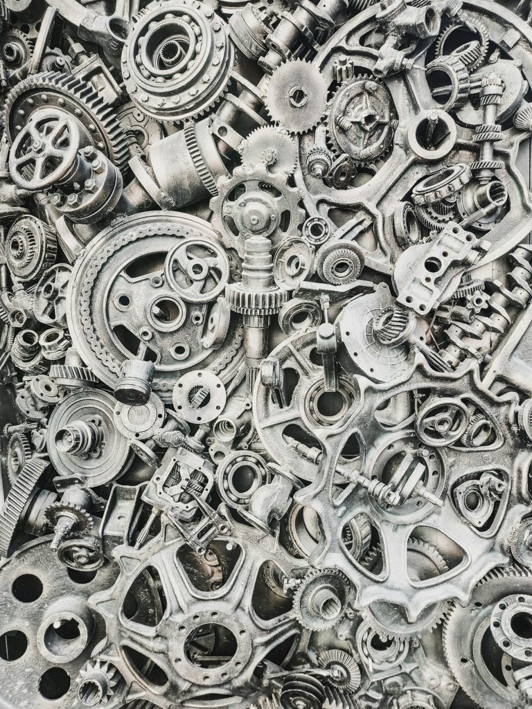 Assorted steel machine parts
